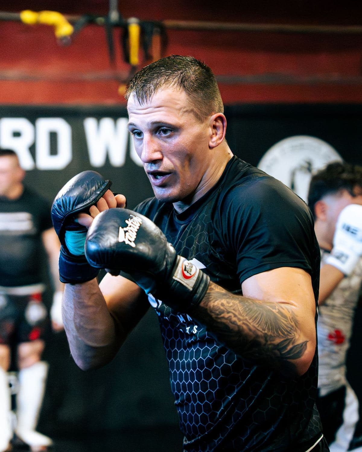 Members sparring during an MMA session at Iron Fight Club Worcester
