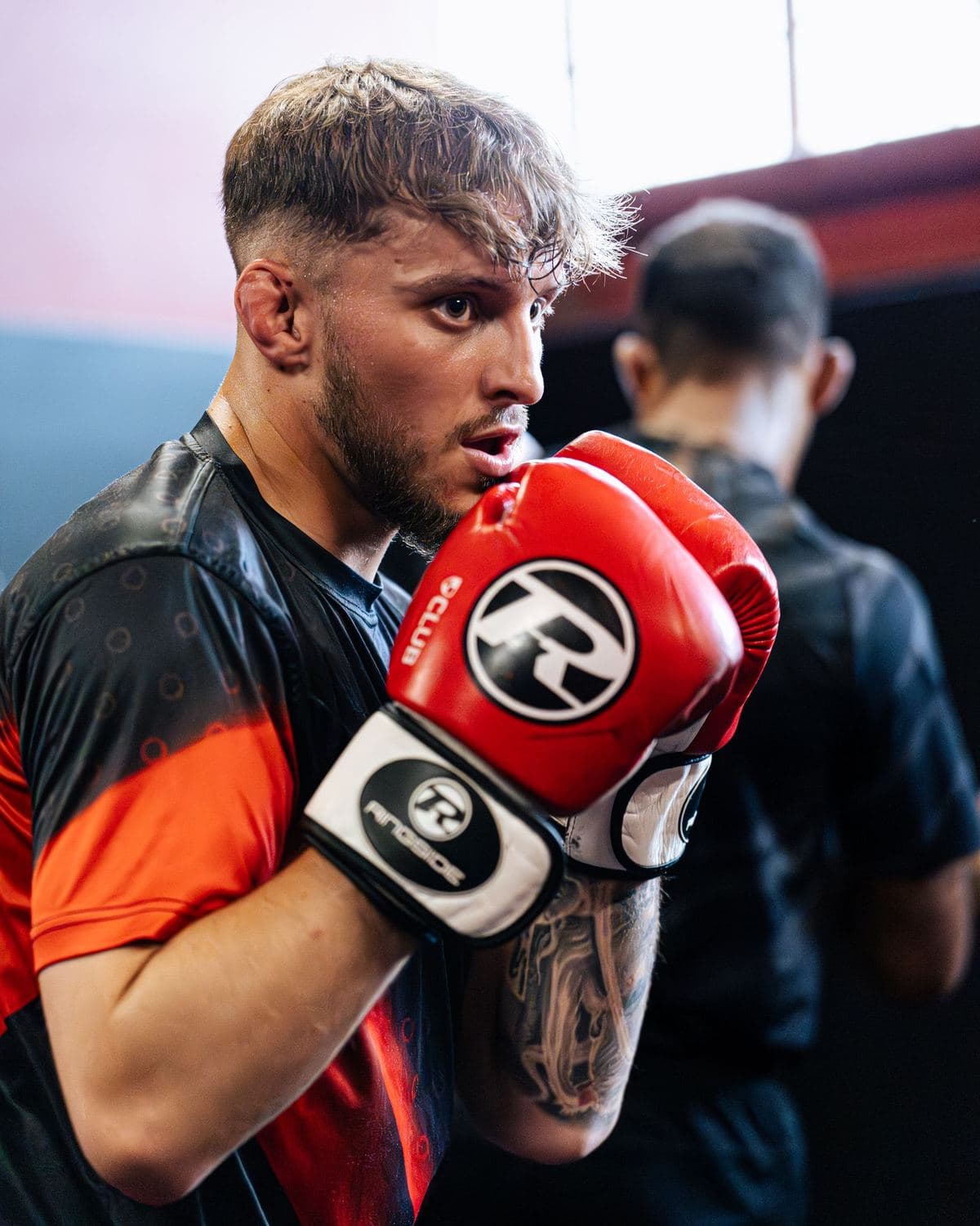 Close-up of red boxing gloves during training at Iron Fight Club Worcester